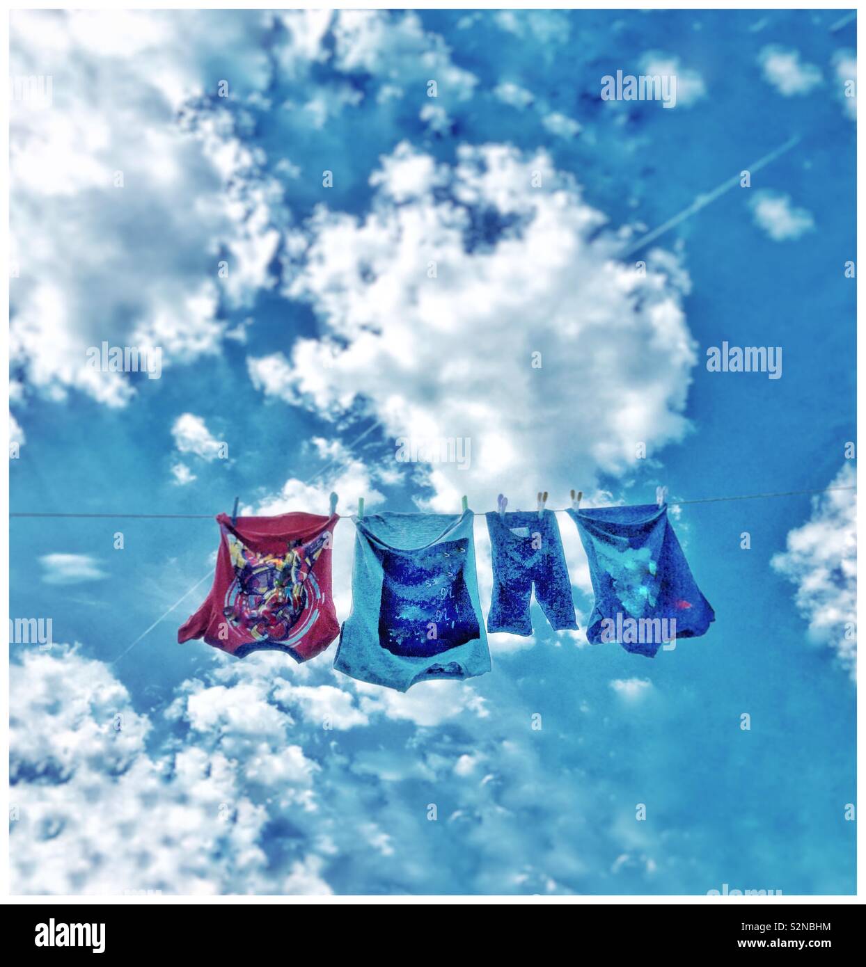 Children’s washing hanging on a clothesline - Smartphone Captured Stock Image