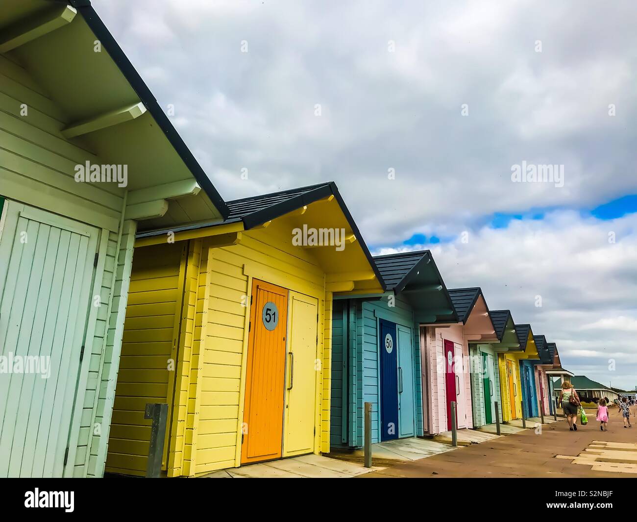 Colourful beach huts on English coast, Mablethorpe, Lincolnshire Stock Photo