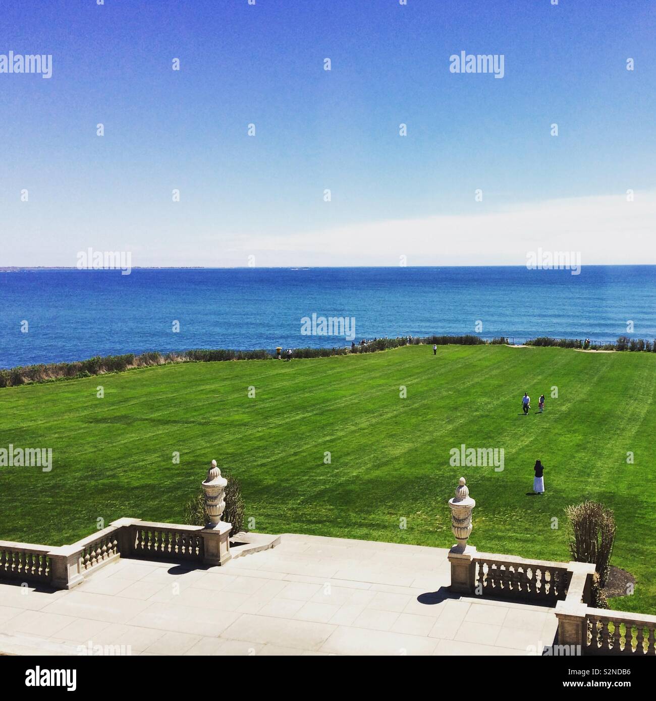 View from the second floor of the back lawn and the ocean at the Breakers, Newport, Rhode Island, United States - Smartphone Captured Stock Image