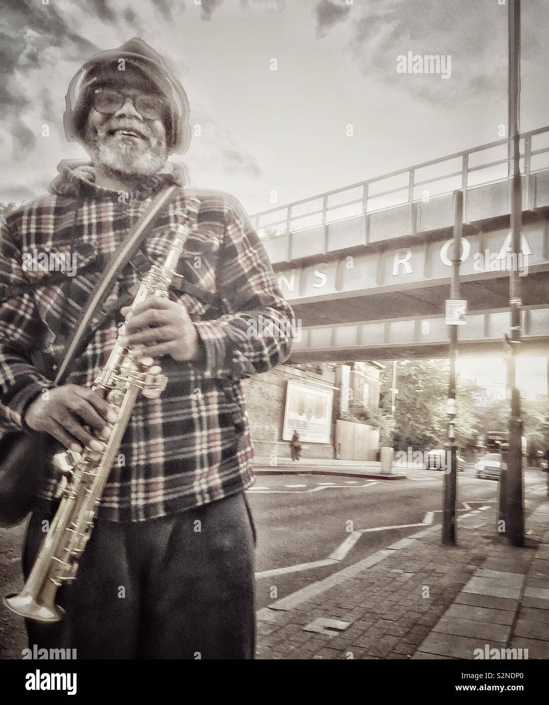 Selwyn the busker at Queens Road Station, South London. - Smartphone Captured Stock Image