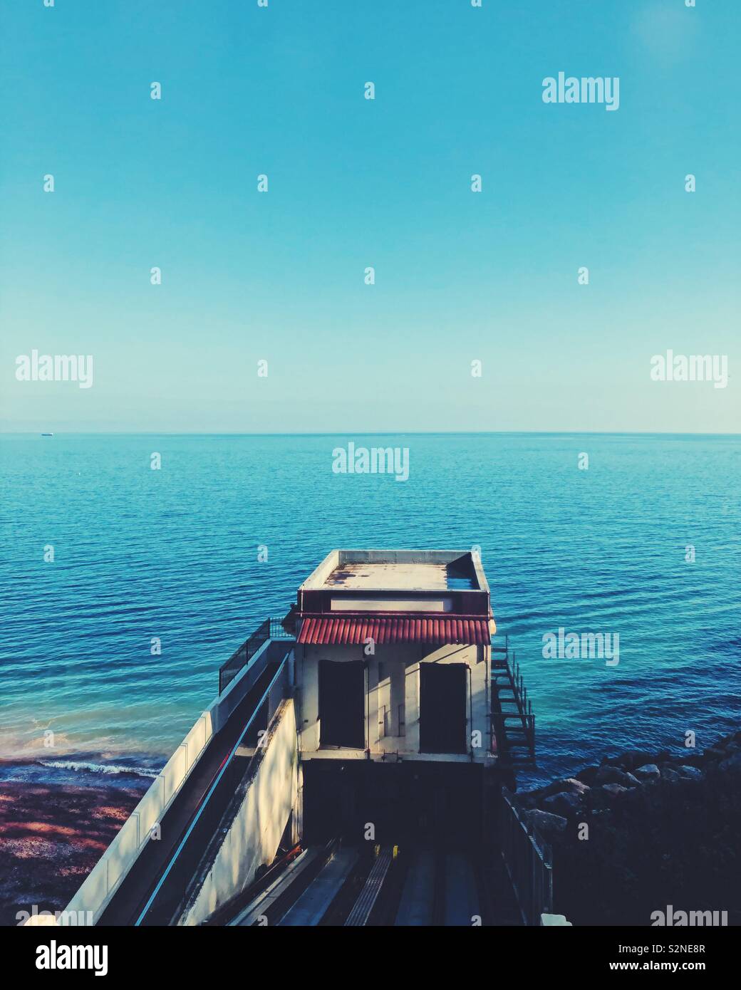 Looking out to sea at the end of Babbacombe Cliff Railway, Torquay, UK. - Smartphone Captured Stock Image