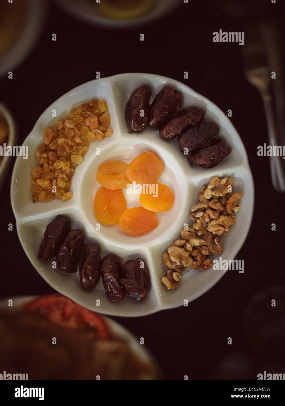 Dates, apricots, yellow raisons, nuts - Smartphone Captured Stock Image