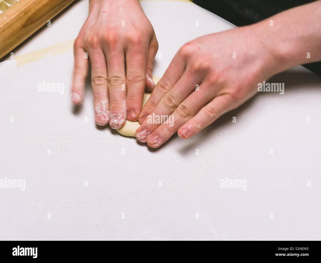 Pressing Dough Stock Photo