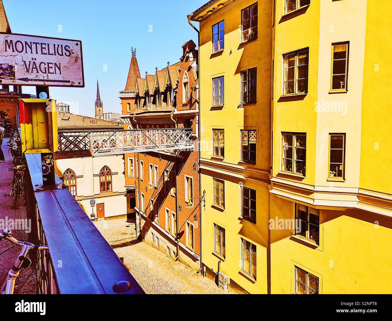 Sign to Monteliusvagen a path with a panoramic view of Stockholm next to the iron bridge across Bastugatan, Sodermalm, Stockholm, Sweden, Scandinavia - Smartphone Captured Stock Image