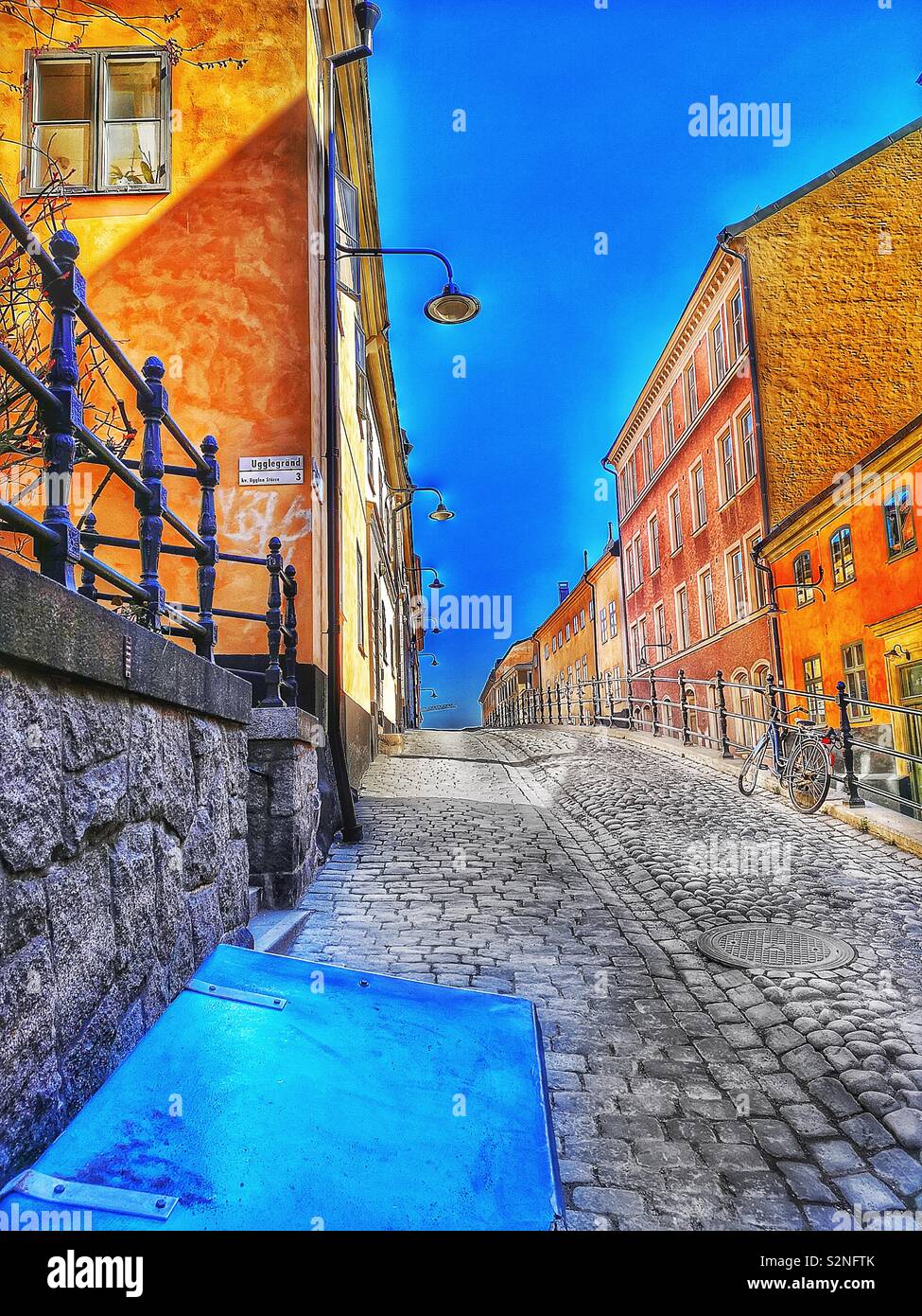 Dusk on Brannkyrkagatan, Sodermalm, Stockholm, Sweden, Scandinavia. The hump known as an apparel is an elevation of part of the street, here called Lilla Puckeln and built in 1885 - Smartphone Captured Stock Image