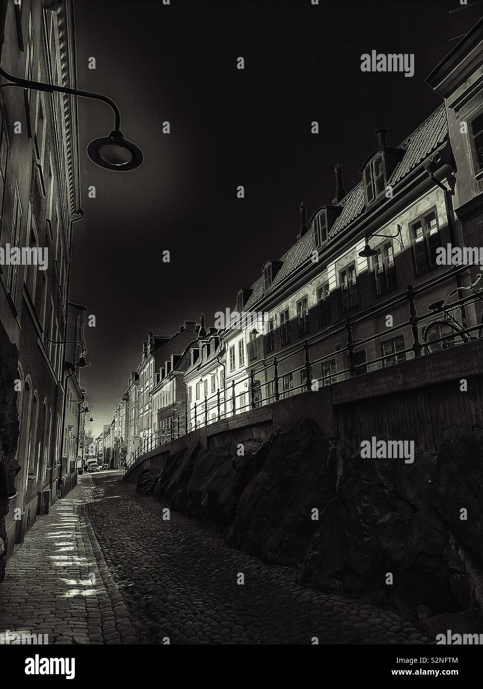 Dusk on Brannkyrkagatan, Sodermalm, Stockholm, Sweden, Scandinavia. The hump known as an apparel is an elevation of part of the street, here called Lilla Puckeln and built in 1885 - Smartphone Captured Stock Image