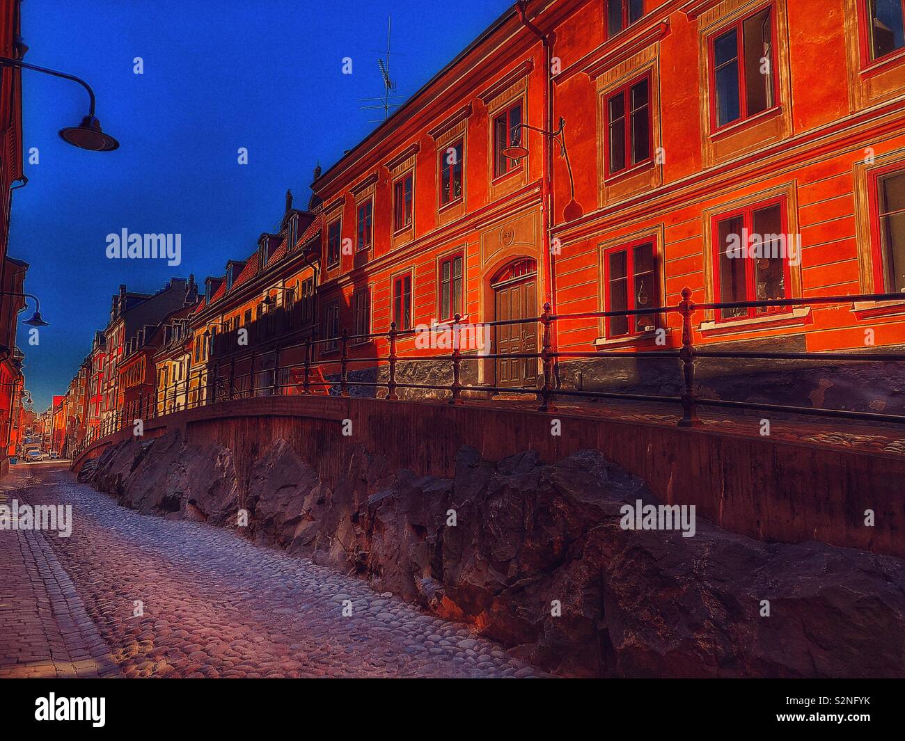 Dusk on Brannkyrkagatan, Sodermalm, Stockholm, Sweden, Scandinavia. The hump known as an apparel is an elevation of part of the street, here called Lilla Puckeln and built in 1885 - Smartphone Captured Stock Image