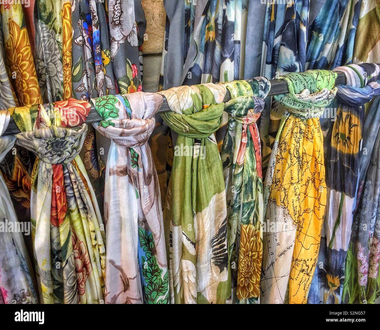 Colourful display of ladies scarves for sale at Chatsworth House, UK