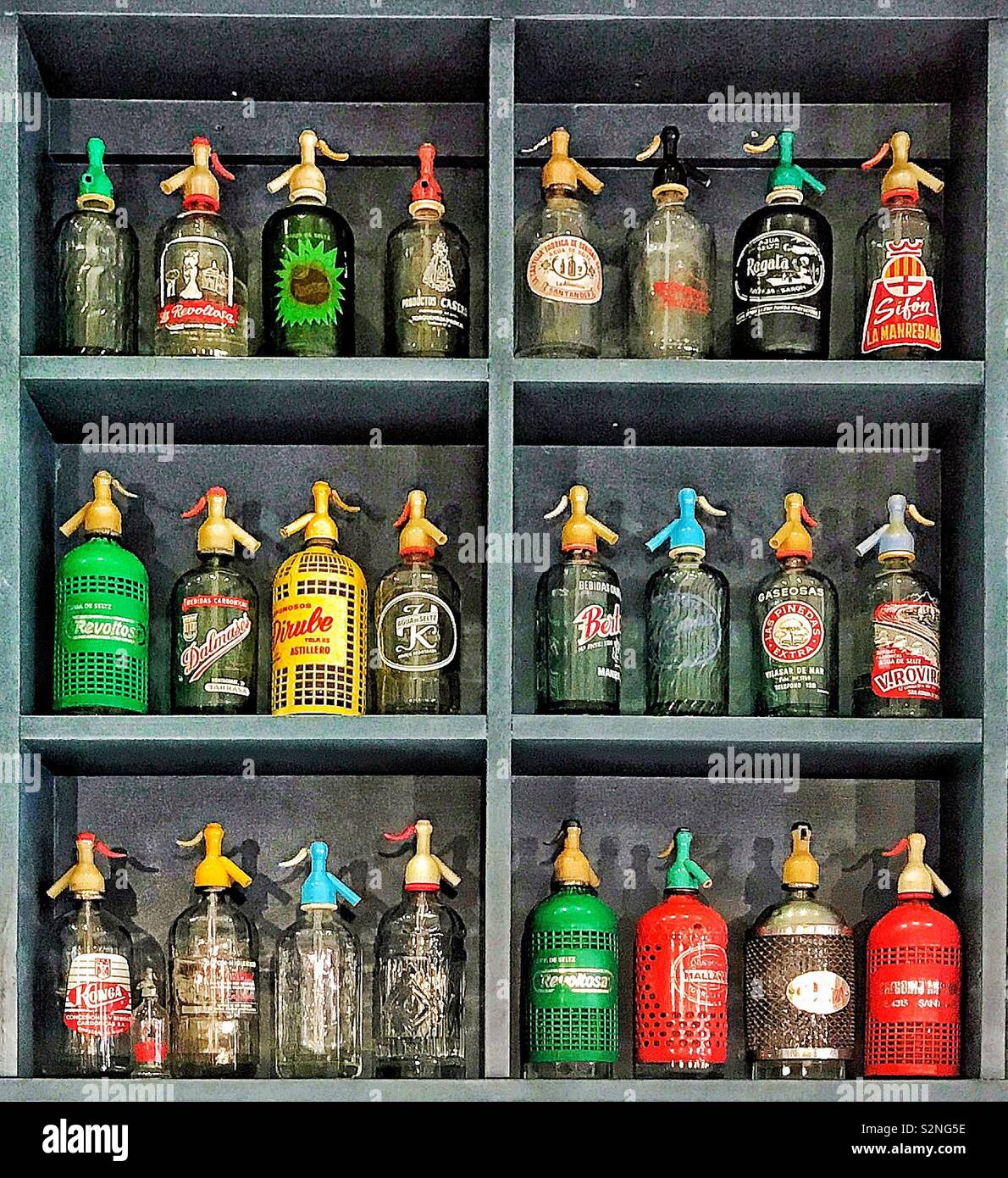 Colourful display of soda syphons Stock Photo