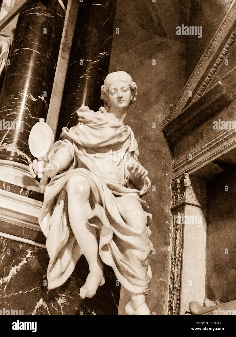 Sculpture of a vain woman in a church in Rome - Smartphone Captured Stock Image