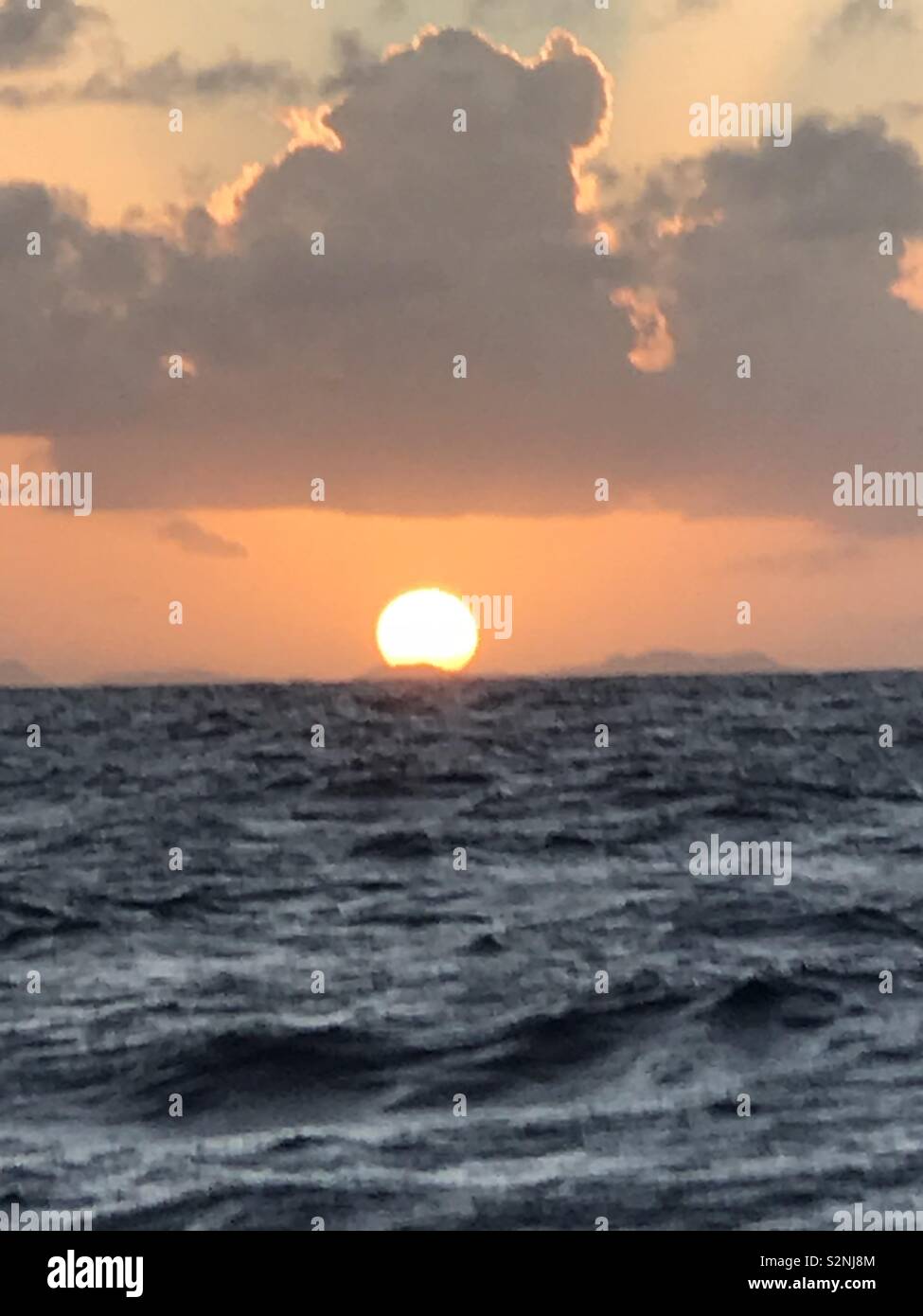 The Sun Sets Over St Lucia As We Finish Our Atlantic Crossing Stock Photo Alamy