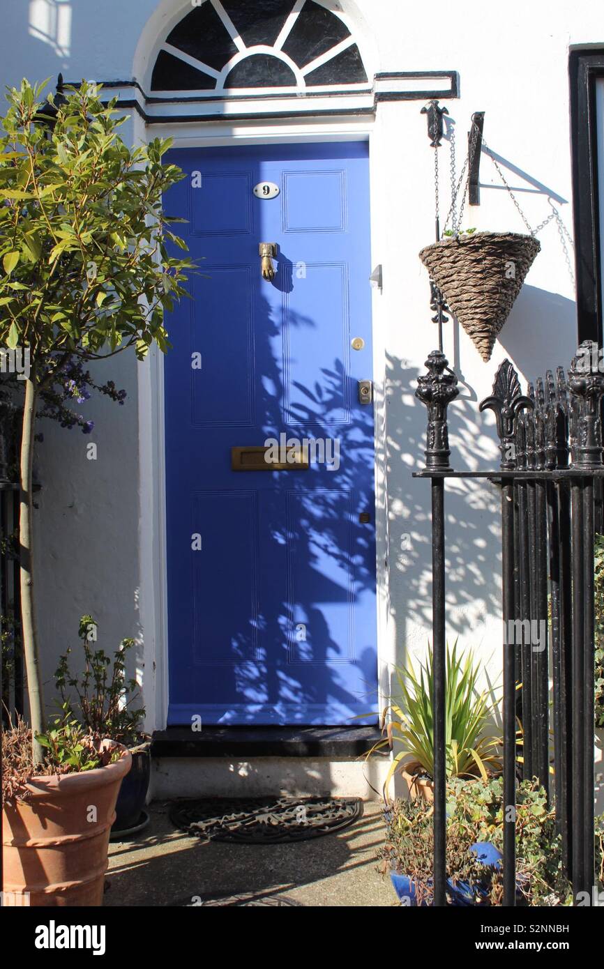 Classic front door in the sunshine Stock Photo Alamy