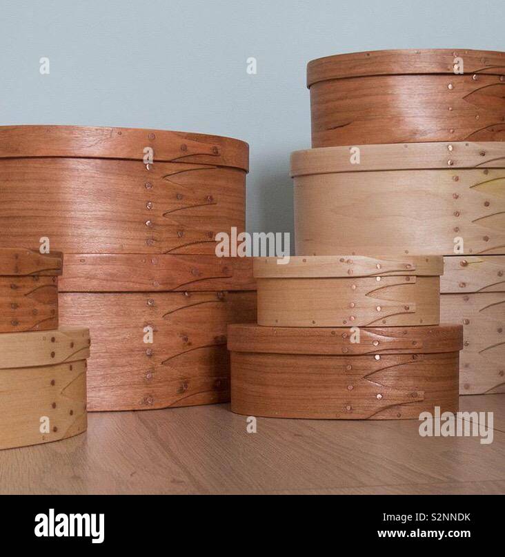 Stack of decorative hat boxes in a room Stock Photo - Alamy