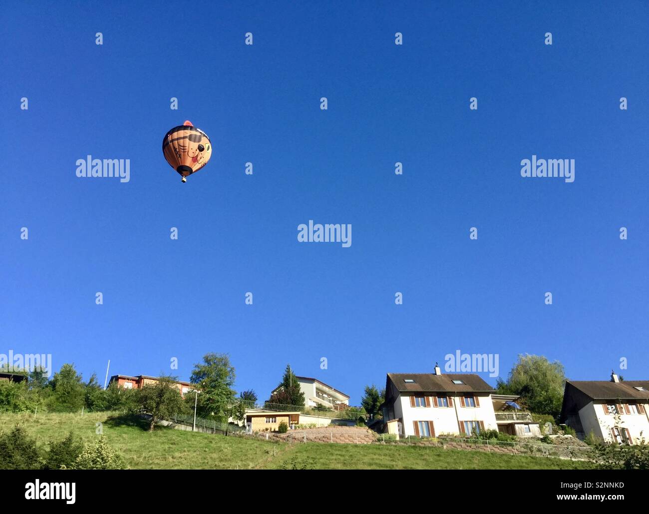 Hot air balloon in blue sky Stock Photo - Alamy