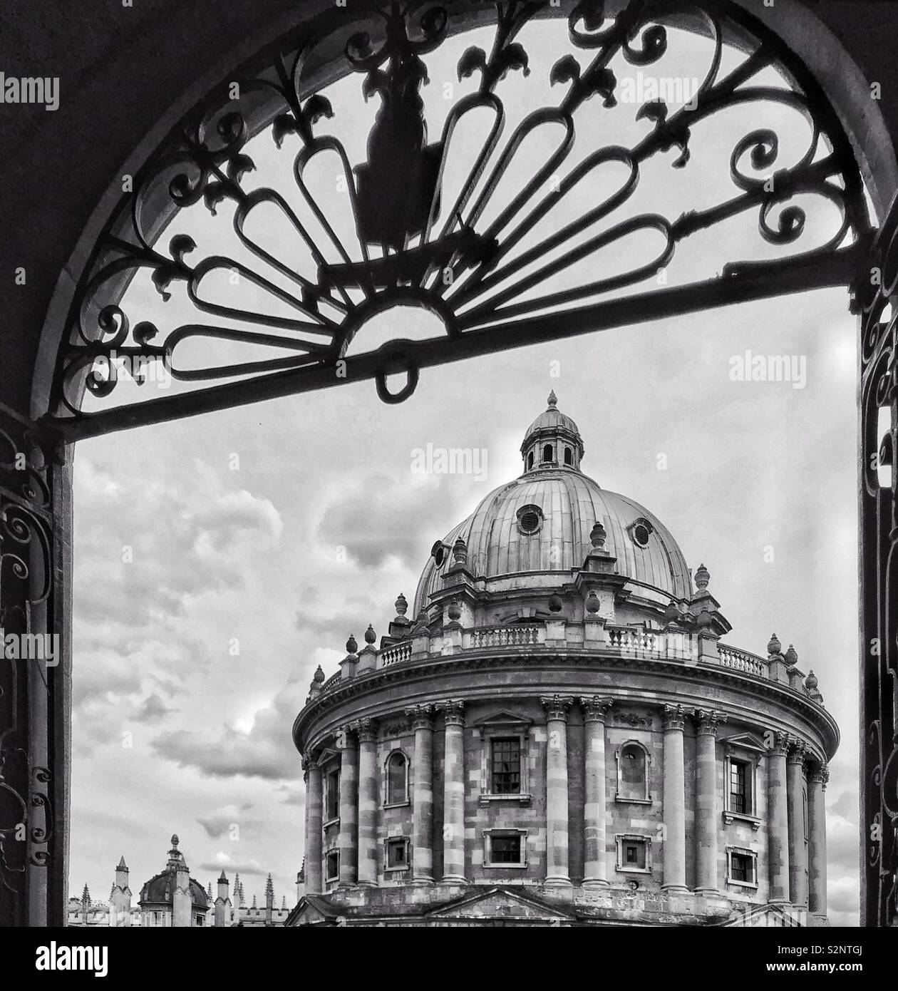 A monochrome image of the view of The Radcliffe Camera Building from the Bodlian Library, Oxford, England. This area is synonymous with the University and a major tourist attraction. © COLIN HOSKINS. - Smartphone Captured Stock Image