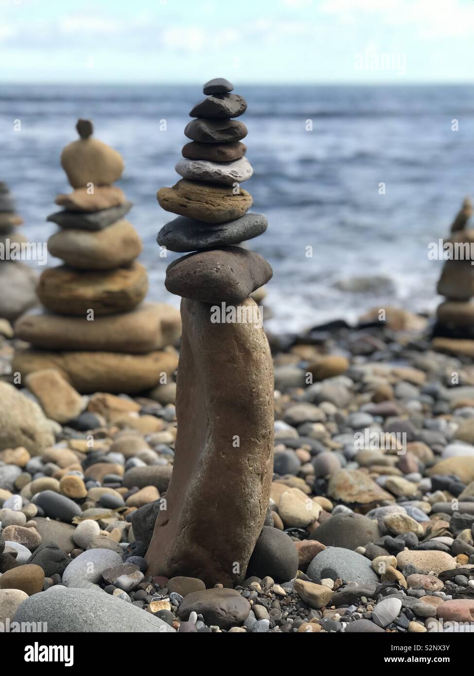 Pebbles on the beach Stock Photo - Alamy