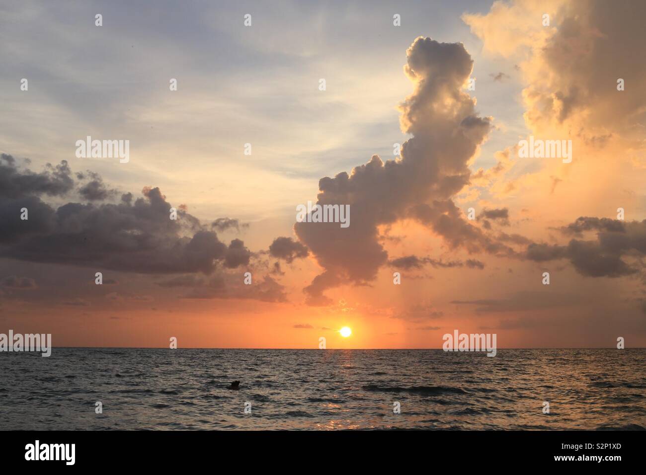 Weird cloud formation sunset Stock Photo