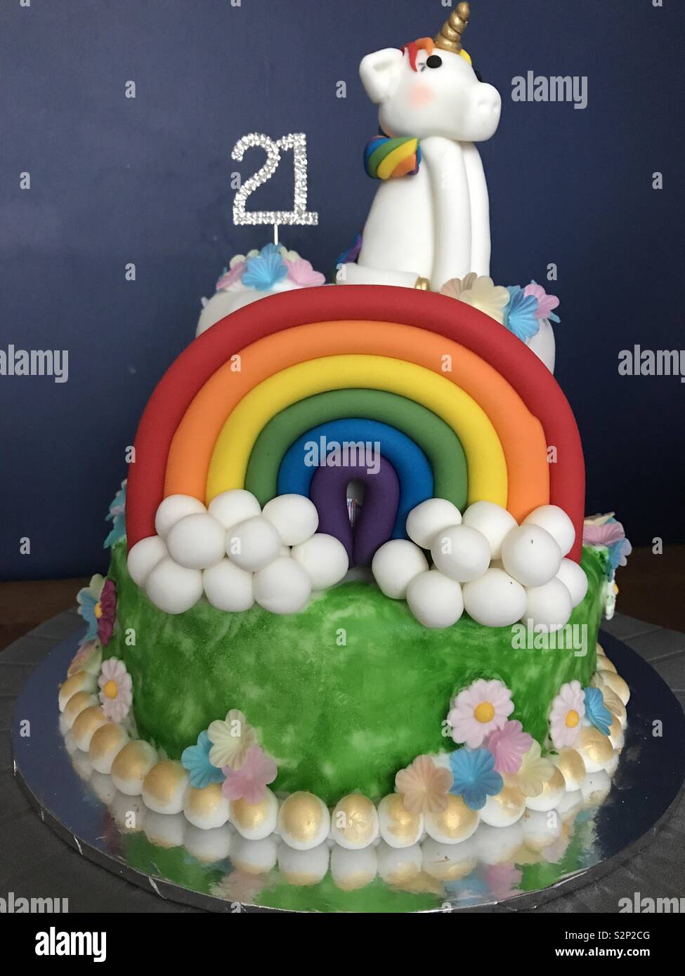 Unicorn and rainbow birthday cake Stock Photo