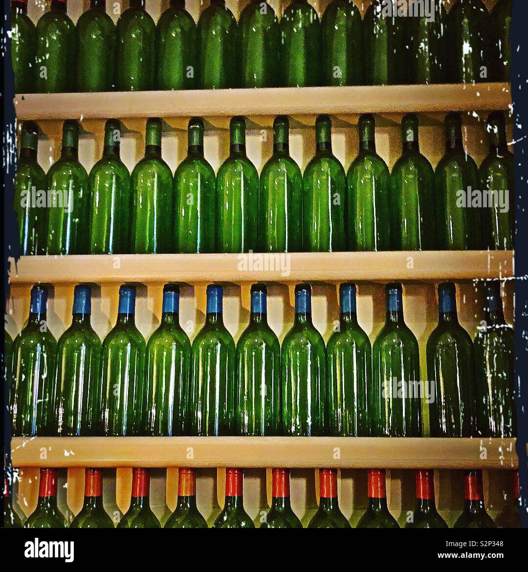 Ten Green Bottles standing on a wall Stock Photo Alamy