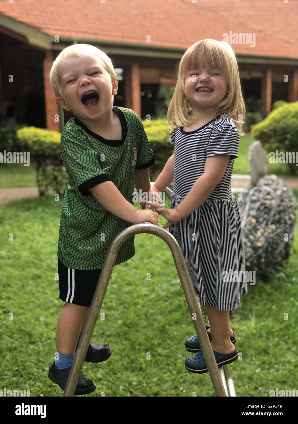 3 year old best friends having fun at school Stock Photo