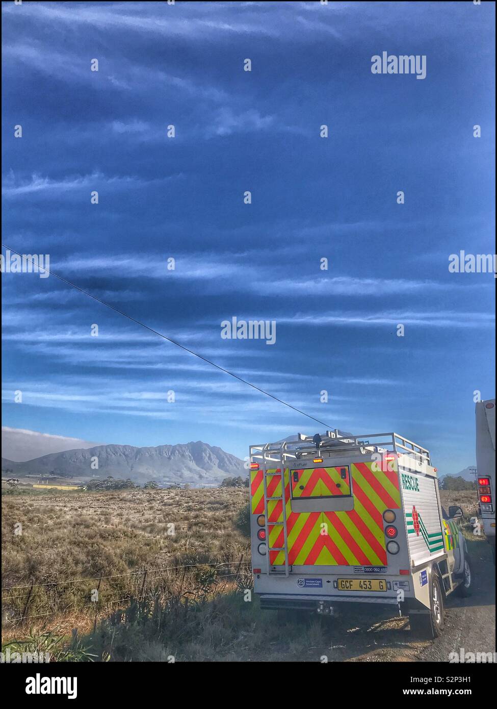 Emergency vehicle in country side. Stock Photo