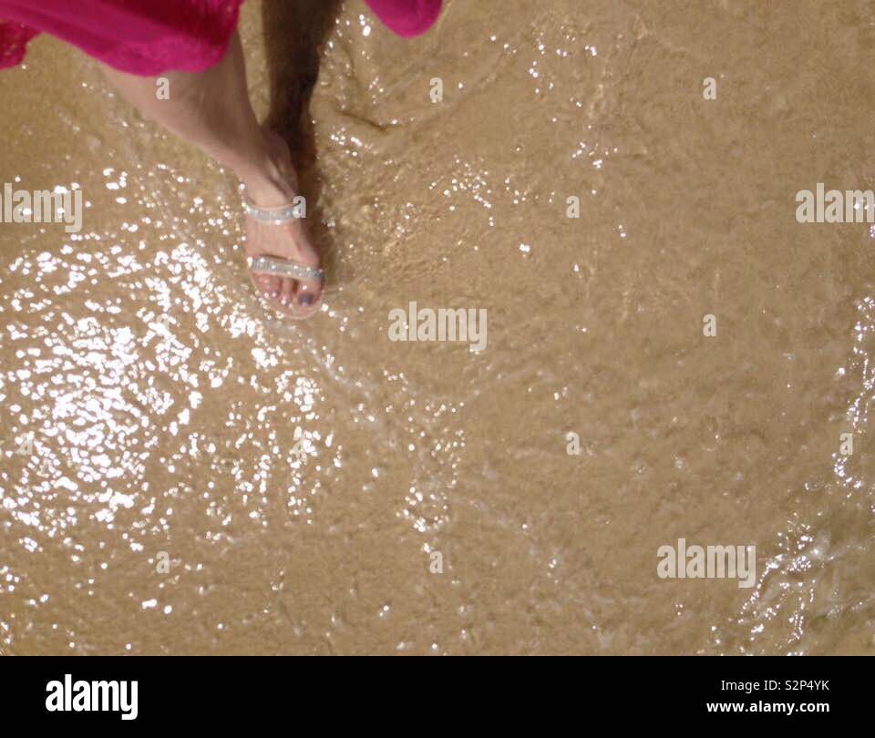 Dipping your toes in Stock Photo Alamy