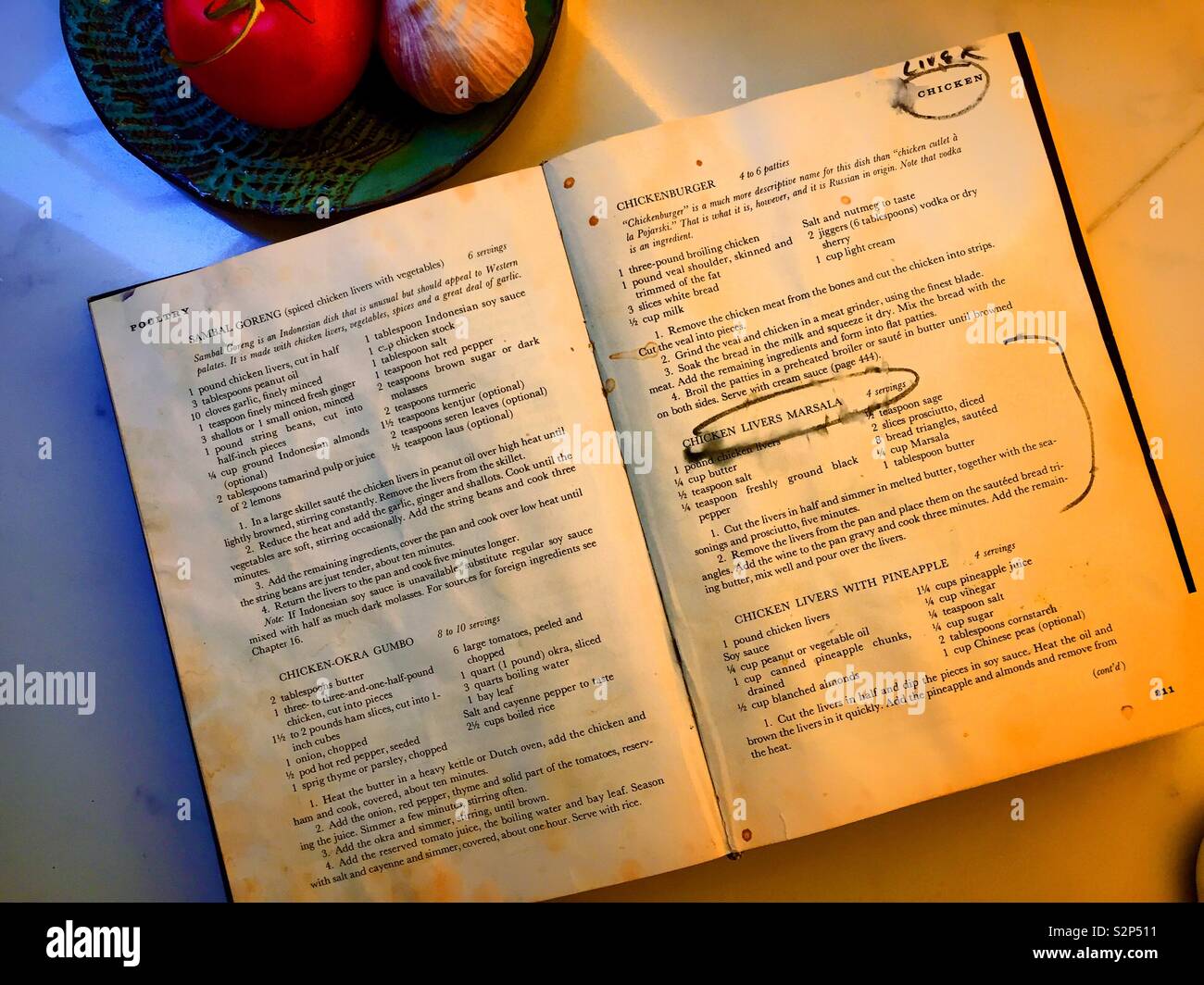 Well used and loved New York times cookbook open to a favorite recipe page, New York City, USA Stock Photo