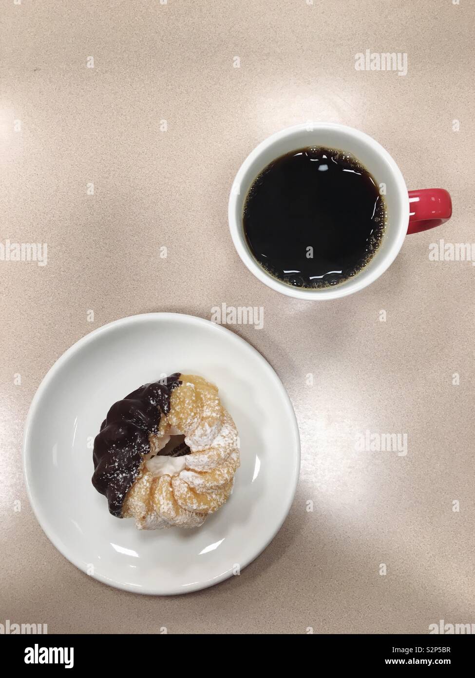 Black coffee and a doughnut - Smartphone Captured Stock Image