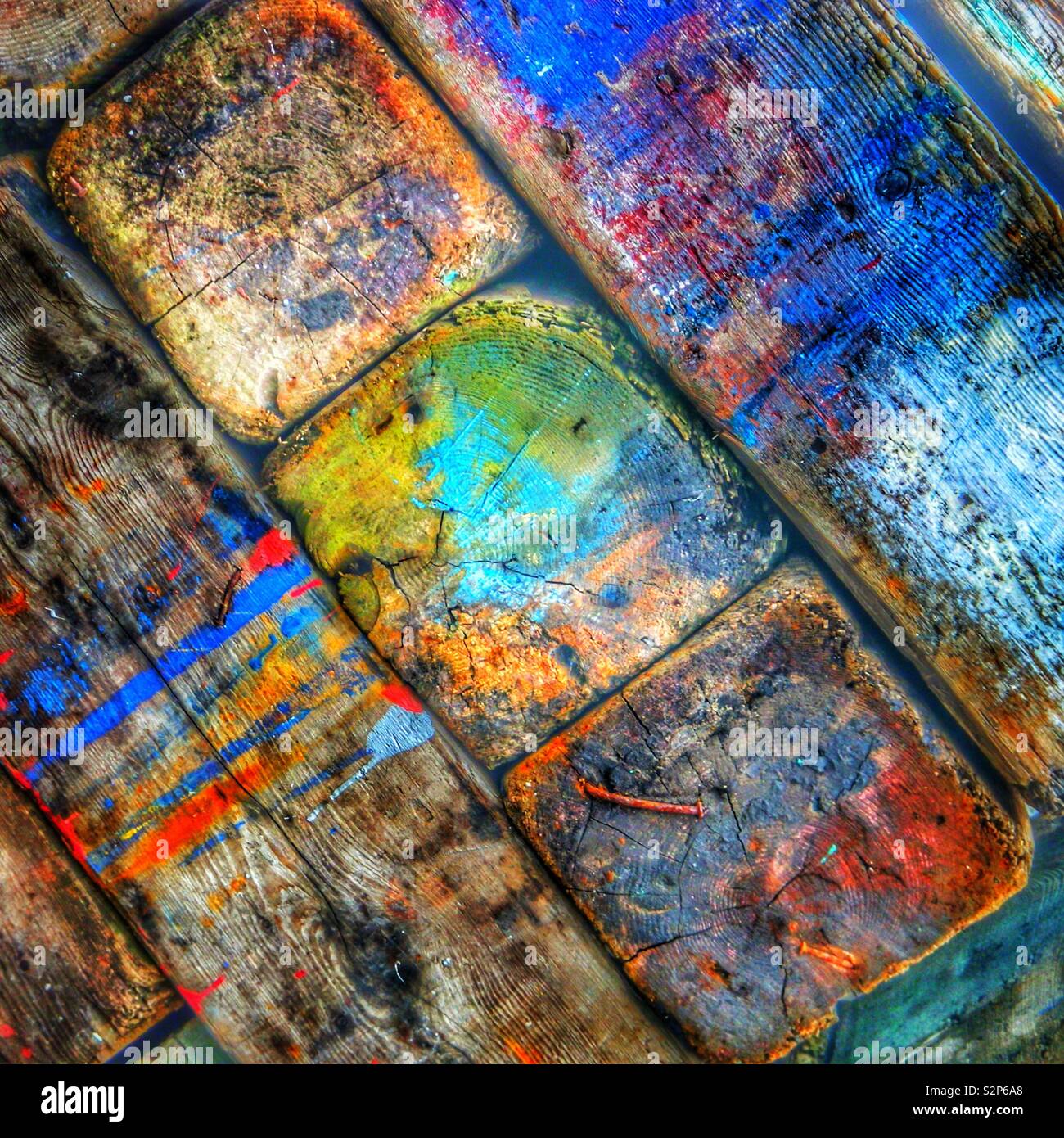 Paint stained wooden batons - Smartphone Captured Stock Image