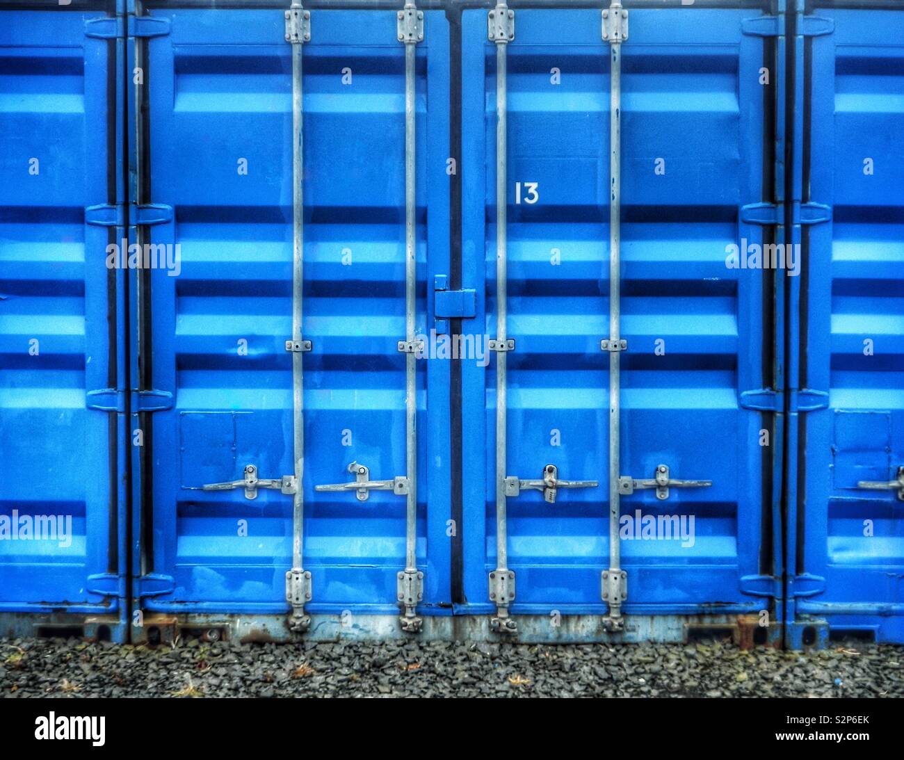 Blue industrial containers with number 13 - Smartphone Captured Stock Image
