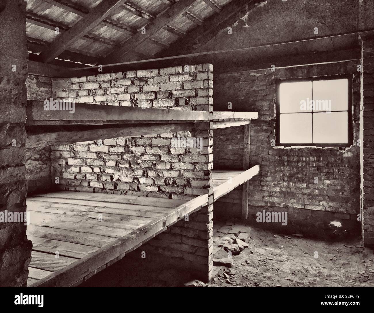 A place of horrific suffering-sleeping quarters of Jewish prisoners at the Nazi Auschwitz II - Birkenau Concentration Camp near Oswiecim in Poland. Thousands of people perished here. © COLIN HOSKINS. - Smartphone Captured Stock Image