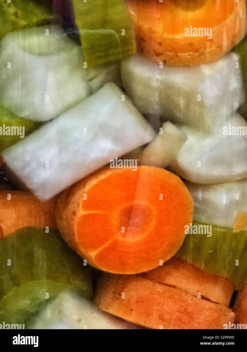 Jar of mixed pickles and pickles carrots in soft focus. Stock Photo