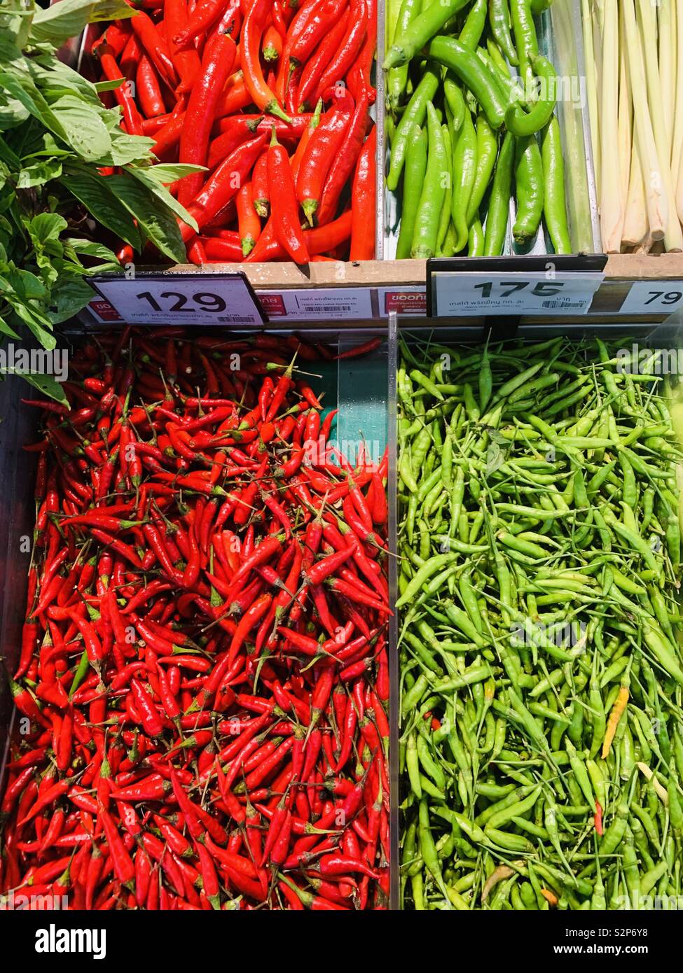 Colorful Thai Chilli peppers at a colorful stall in northern Thailand. Stock Photo