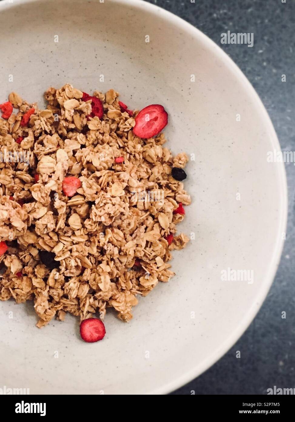 Cropped photo of strawberry crisp granola cereal from above - Smartphone Captured Stock Image