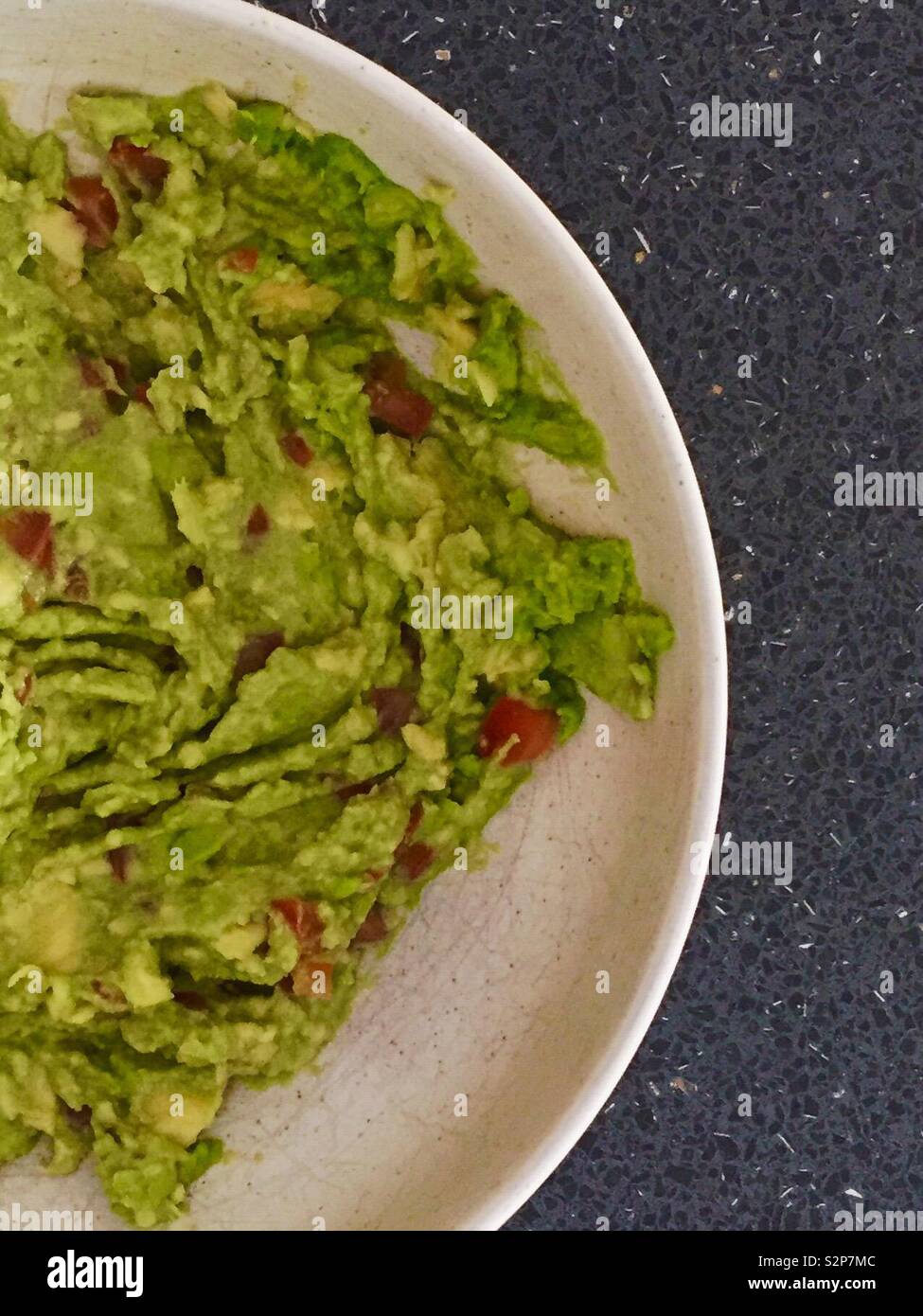 Bowl of guacamole dip Stock Photo