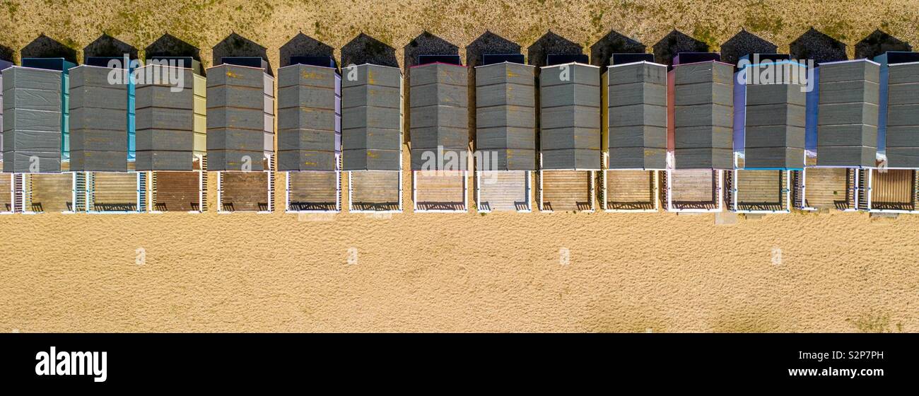 Beach huts on a beach shot from above looking down - Smartphone Captured Stock Image