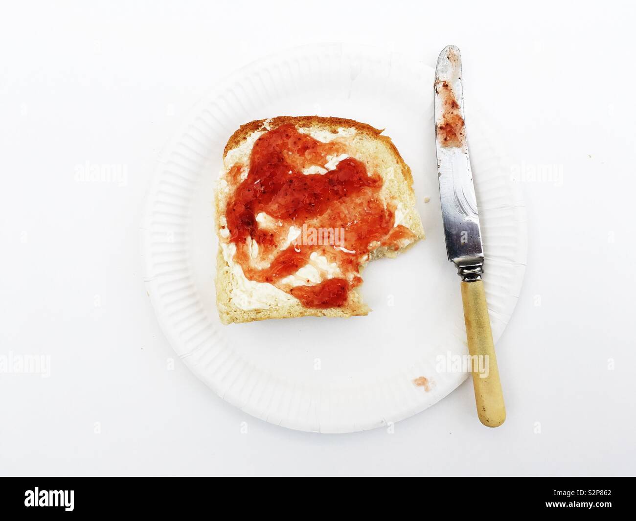 Homemade strawberry jam on Farmhouse white bread - Smartphone Captured Stock Image
