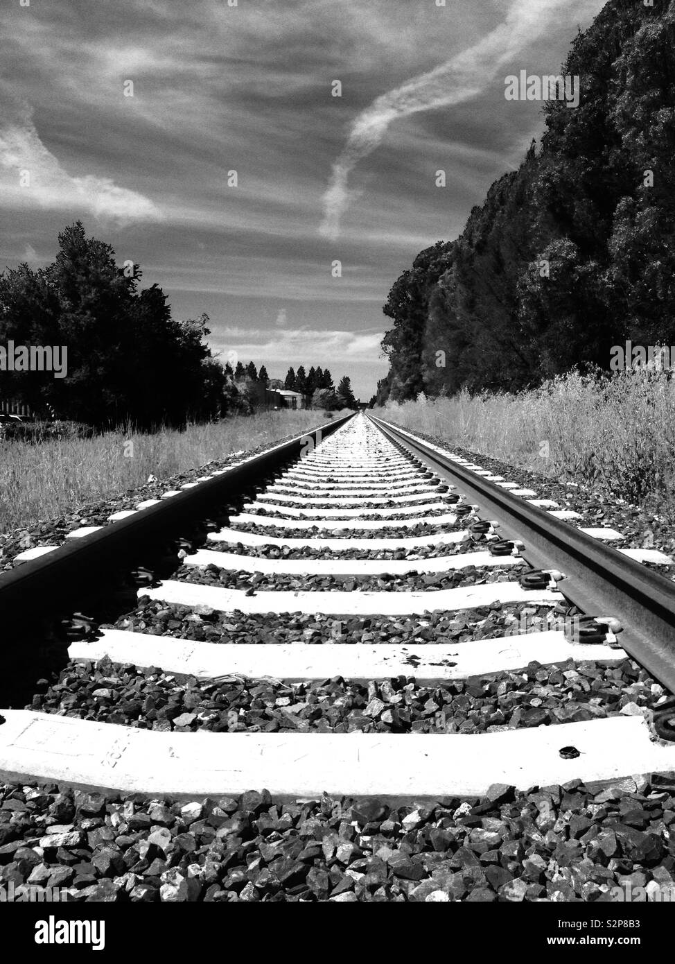 Railroad tracks into the distance Stock Photo Alamy