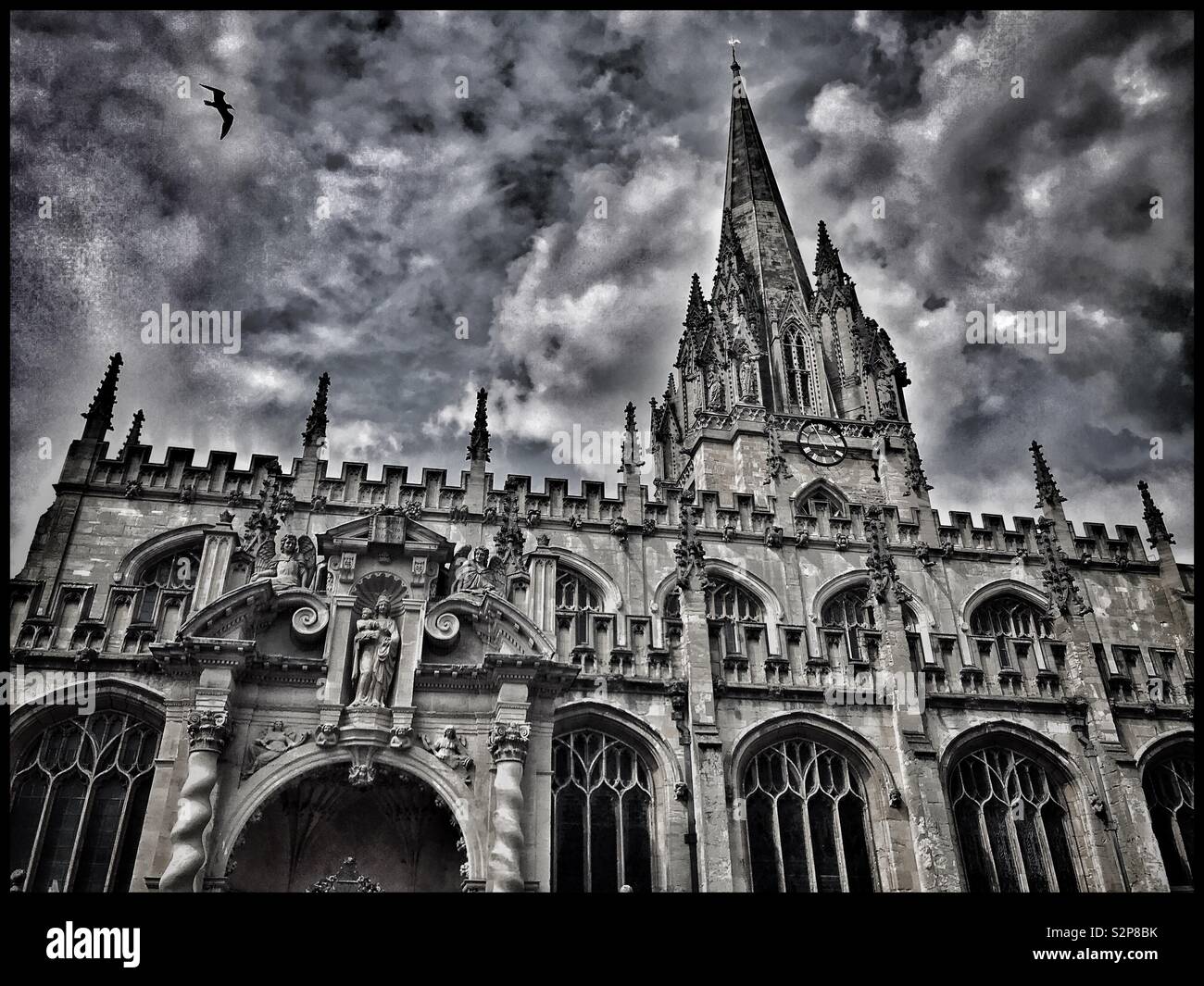 A moody image of the University Church Of St. Mary the Virgin in Oxford, England. This parish church has much history and is deeply connected to Oxford University. Photo © COLIN HOSKINS. - Smartphone Captured Stock Image