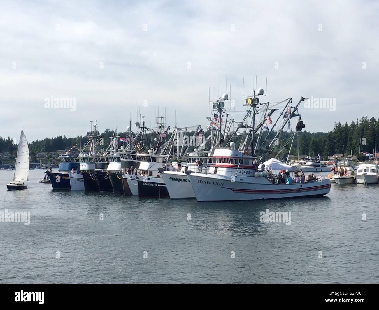 Fishing boats lined up for the Blessing of the Fleet in Gig Harbor