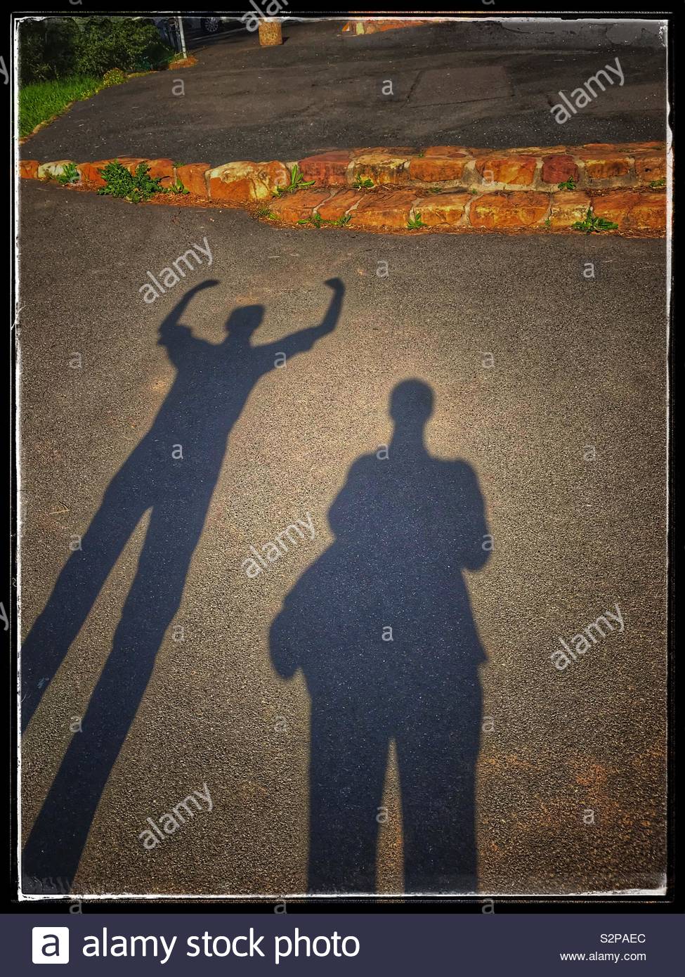 Man making funny shadow Stock Photo - Alamy