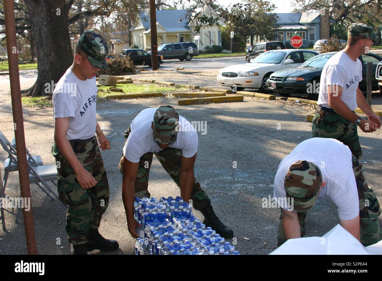 Air Force personnel begin to deliver bottled water to Hurricane Katrina victims. Stock Photo