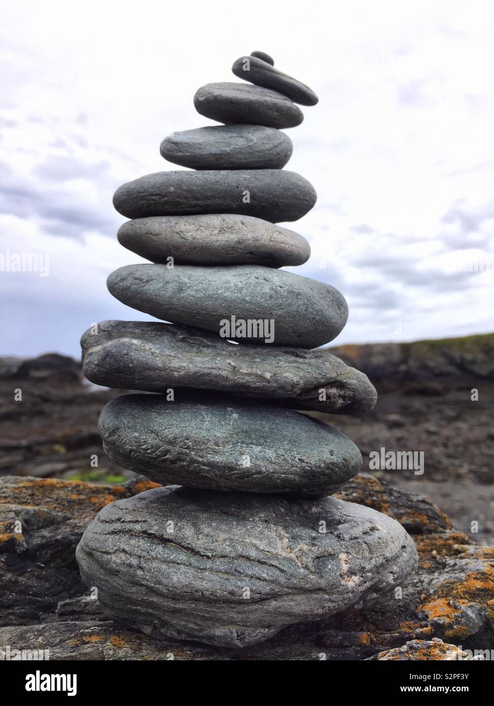 Pile of rocks on a coastal beach. Stack of rocks Stock Photo Alamy
