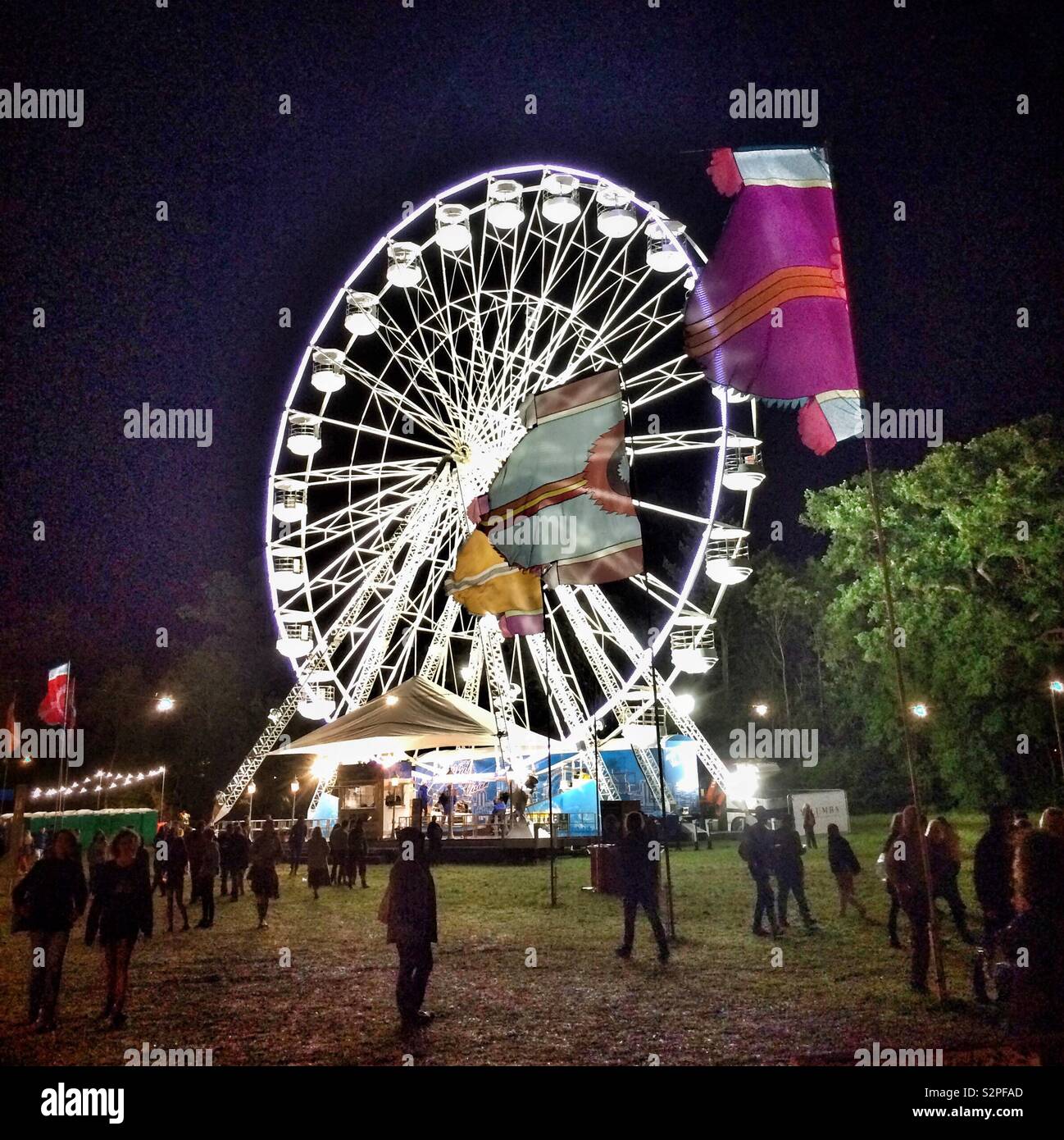 A Ferris wheel at night at the Womad festival in Malmesbury - Smartphone Captured Stock Image