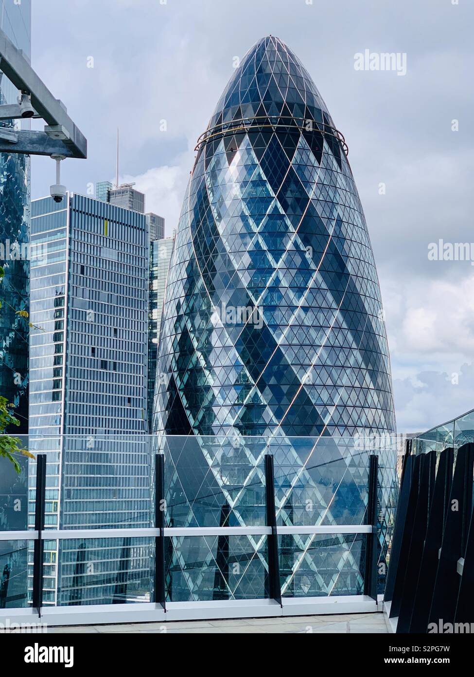 London, UK - 7th June 2019 - The Gherkin, a 30 plus storey skyscraper in the City of London. - Smartphone Captured Stock Image