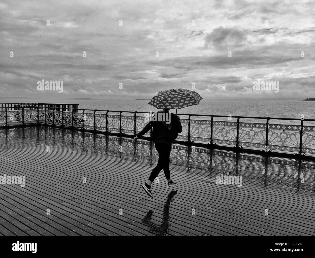 Dancing in the rain - Smartphone Captured Stock Image