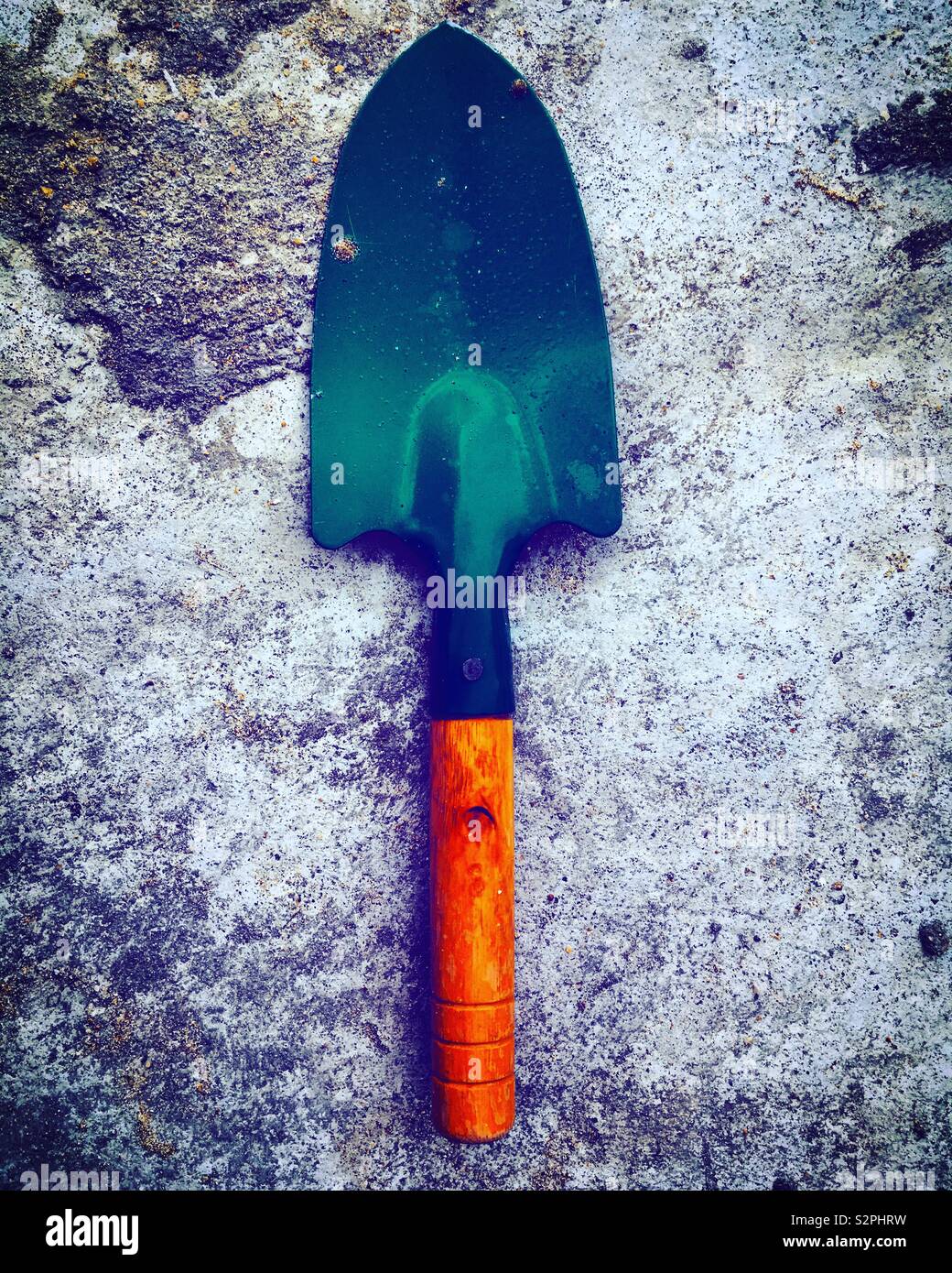 small green shovel for gardening - Smartphone Captured Stock Image