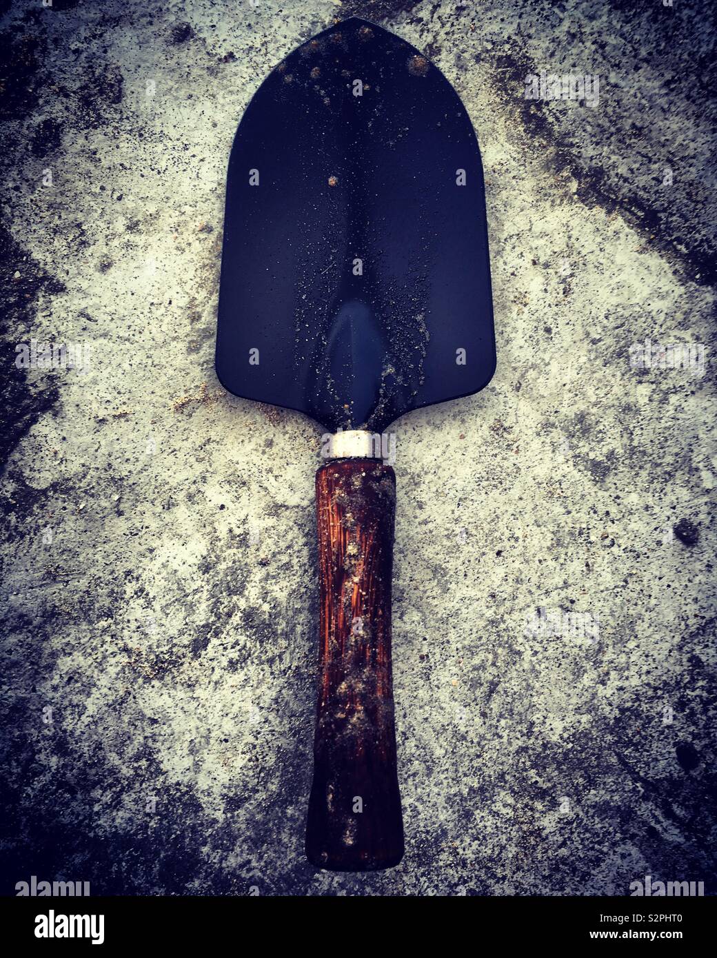 Small black metal shovel for gardening Stock Photo