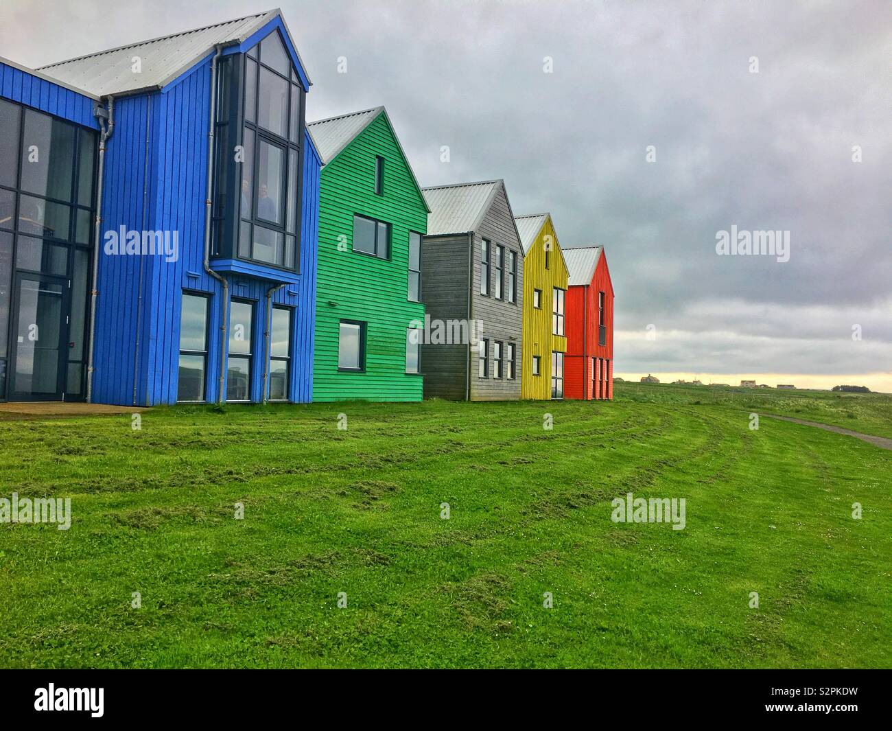 Bright coloured houses, John O’Groats Stock Photo Alamy