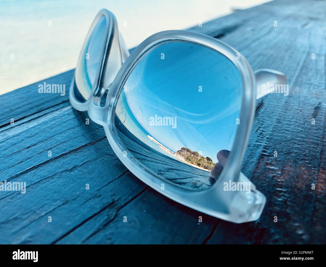 Beach reflection in sunglasses. Stock Photo